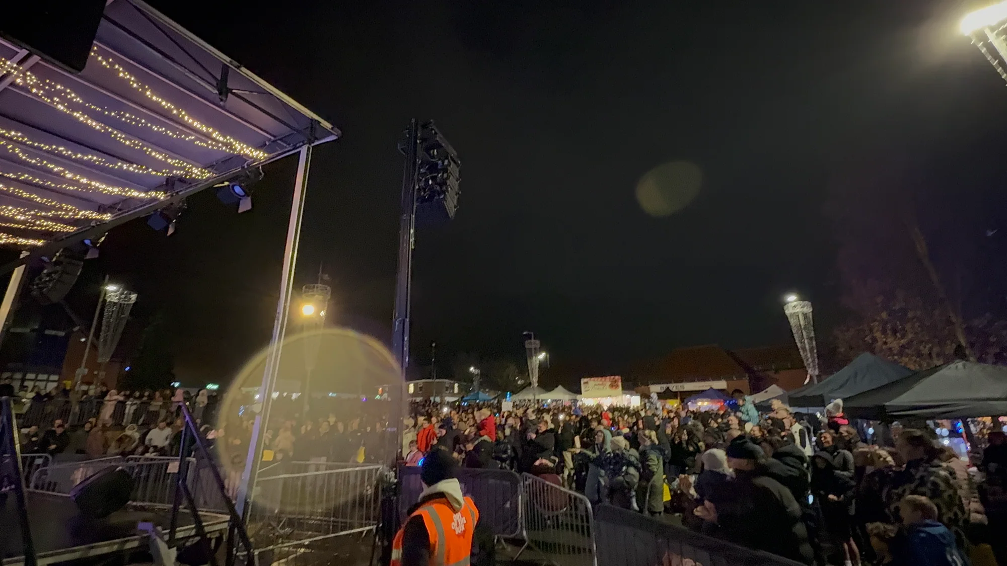 Town-centre audience watching the Ashfield Christmas light switch-on stage