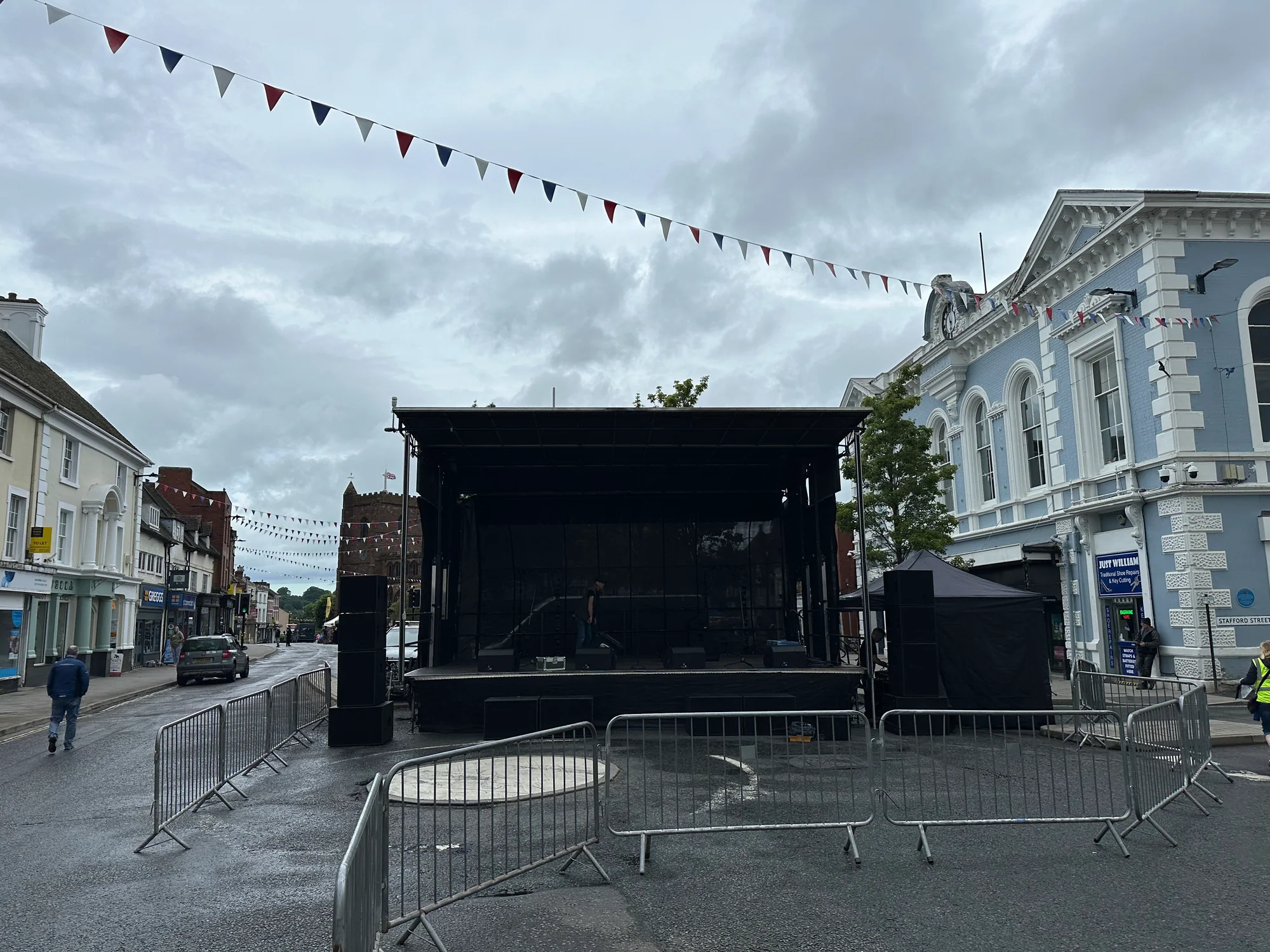 Empty 8m x 6m trailer stage positioned on Newport's town-centre mini-roundabout in 2024